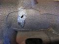 Click image for larger version

Name:	e6cracknhole.jpg
Views:	140
Size:	55.1 KB
ID:	168966