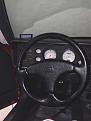 Click image for larger version

Name:	factory steering wheel.JPG
Views:	185
Size:	81.9 KB
ID:	180628
