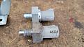 Aftermarket knock sensor top, OEM bottom